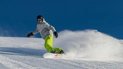 Stå på snowboard i Lofer, lækre pister.