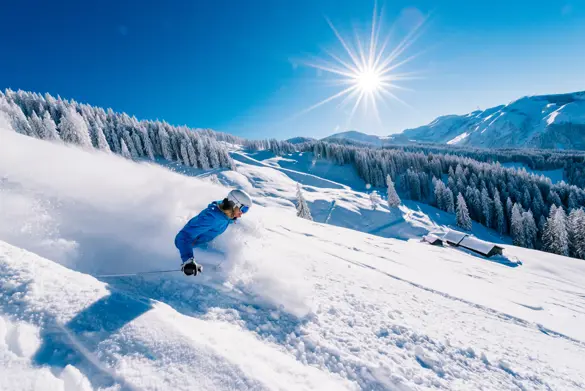 Bilder från Ischgl och en som åker skidor i dess skidområde som ligger i Silvretta Arena och erbjuder förstklassig skidåkning.