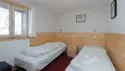4-bäddsrum (2 rum med 1 dubbelsäng och 1 våningssäng)